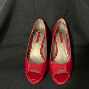 Bandolino red patent peep toe pump